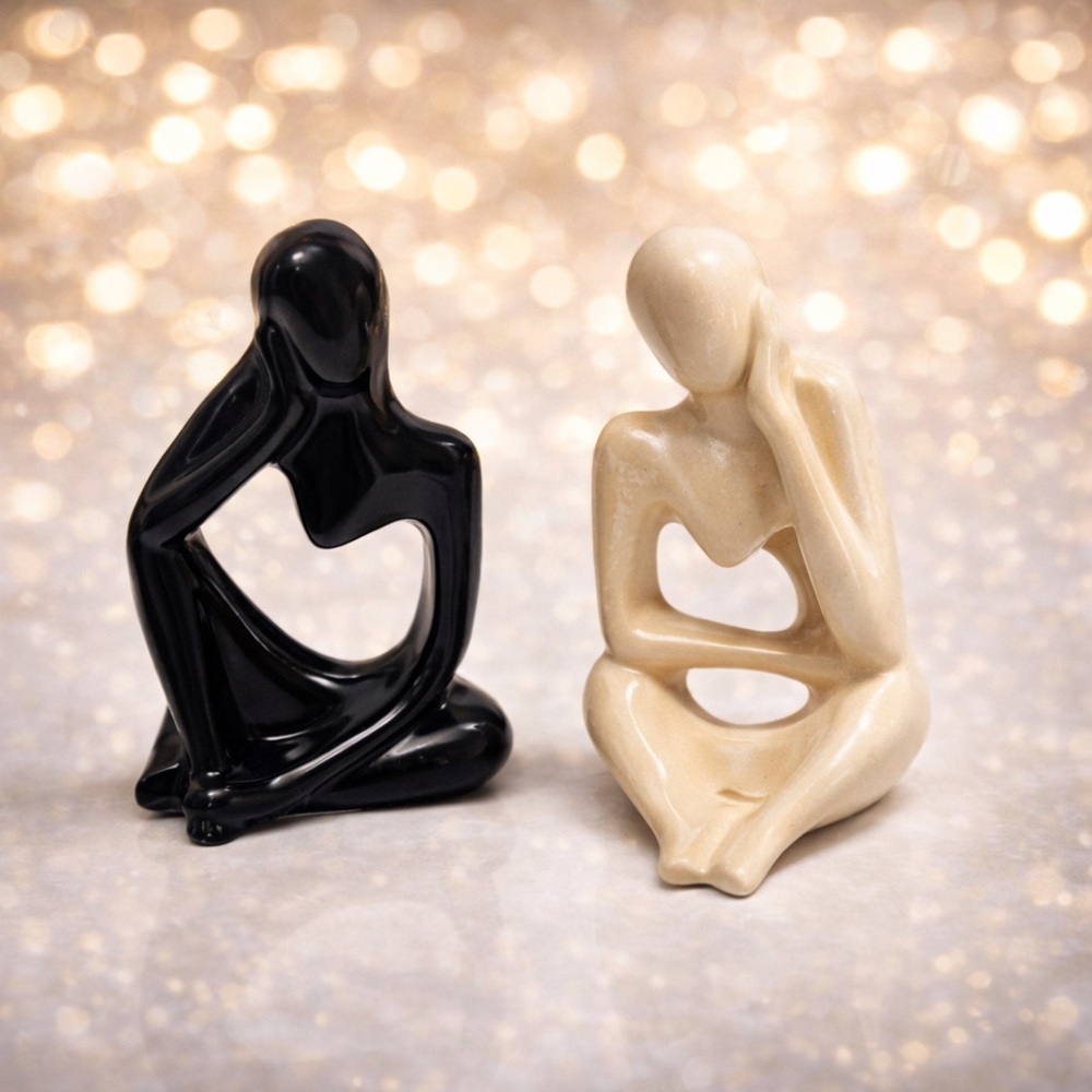 Elegant Black and Cream Abstract Sculptures